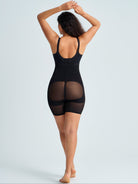 Woman wearing a black shapewear tummy control panties. The brand is Baerely who supports flattering dresses to hide tummy & women's shapewear & shapewear underwear.
