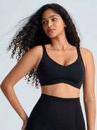 Woman wearing a full coverage wireless bra. The brand is Baerely who supports full coverage wireless bras for women.