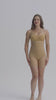 Woman wearing a nude shapewear tummy control panties. The brand is Baerely who supports shapewear for women & shapewear for women butt lift.